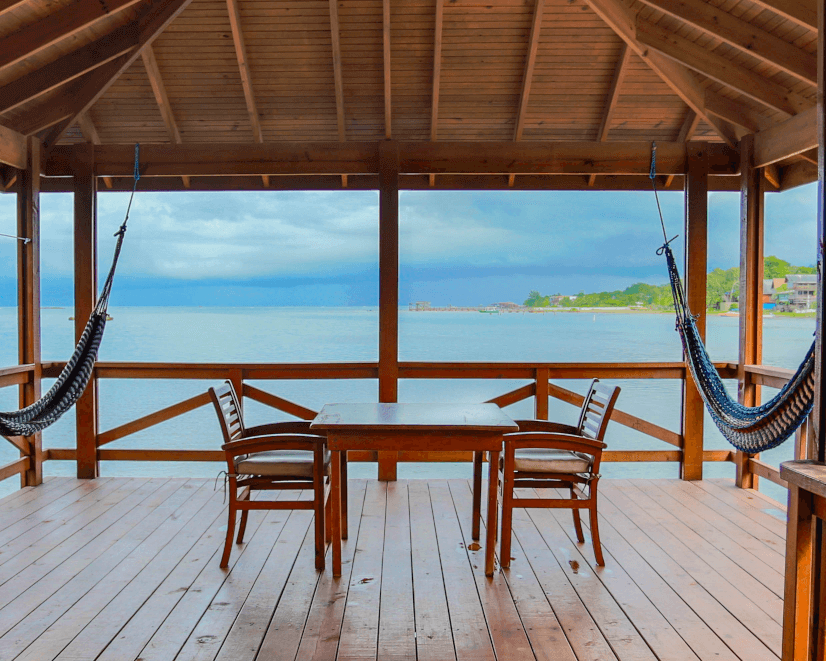 Patio with hammocks on bungalow overlooking the ocean