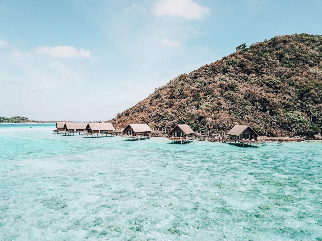 Drone view of overwater bungalows